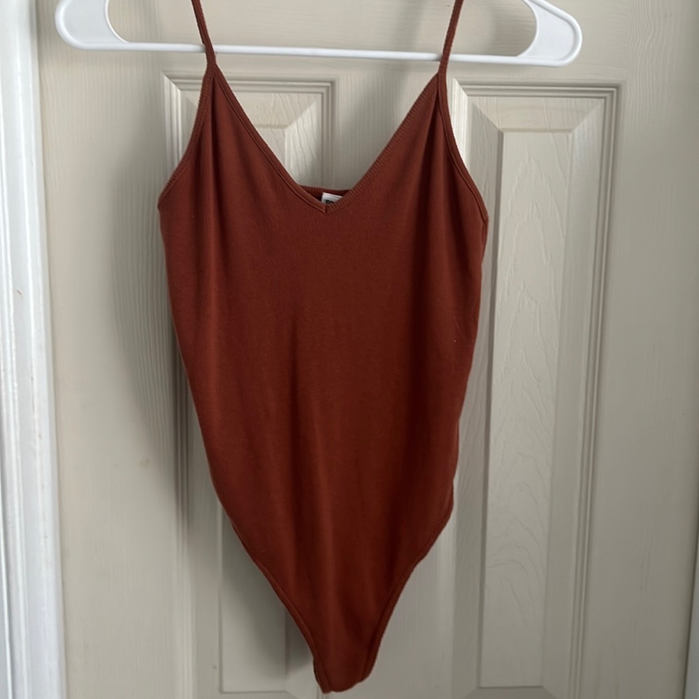 Burnt orange bodysuit